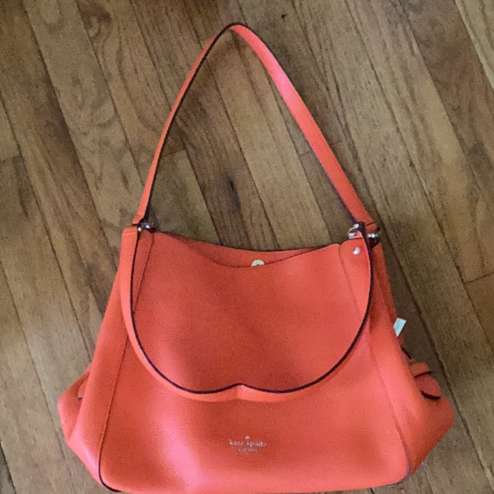 Orange Kate Spade purse. No flaws.